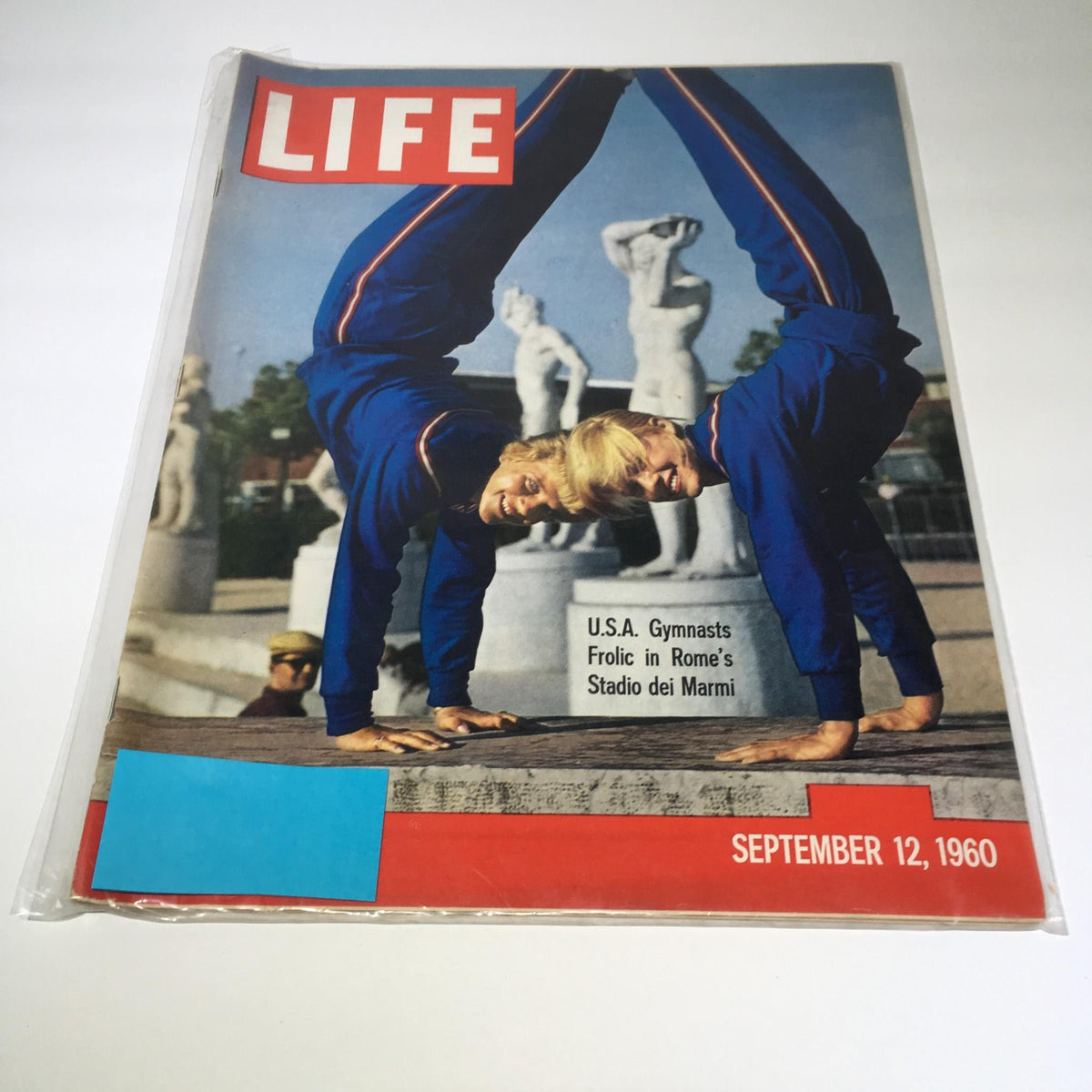 Vintage Life Magazine cover from September 12, 1960, featuring U.S.A. gymnasts frolicking in Rome's Stadio dei Marmi, showcasing stunning gymnastics visuals and cultural context of the 1960s.