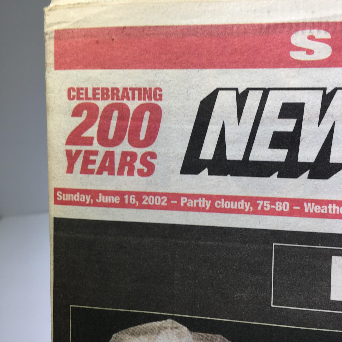 Close-up of the New York Post's date, celebrating 200 years, dated June 16, 2002.