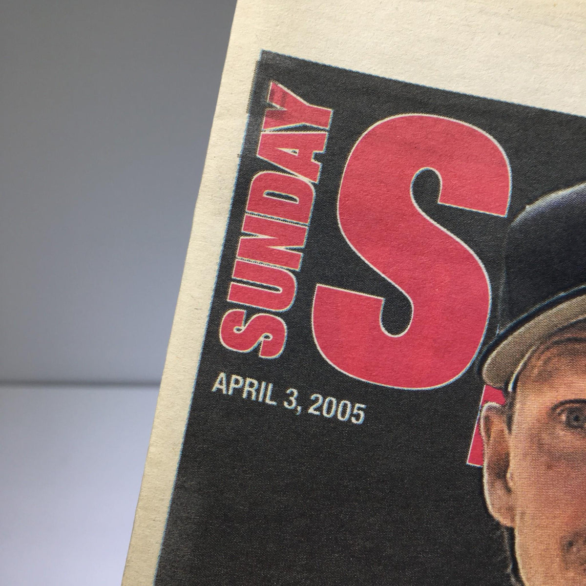 Close-up of the New York Post: April 3, 2005 header, displaying 'SUNDAY' and the date, highlighting the significance of the publication in sports history.