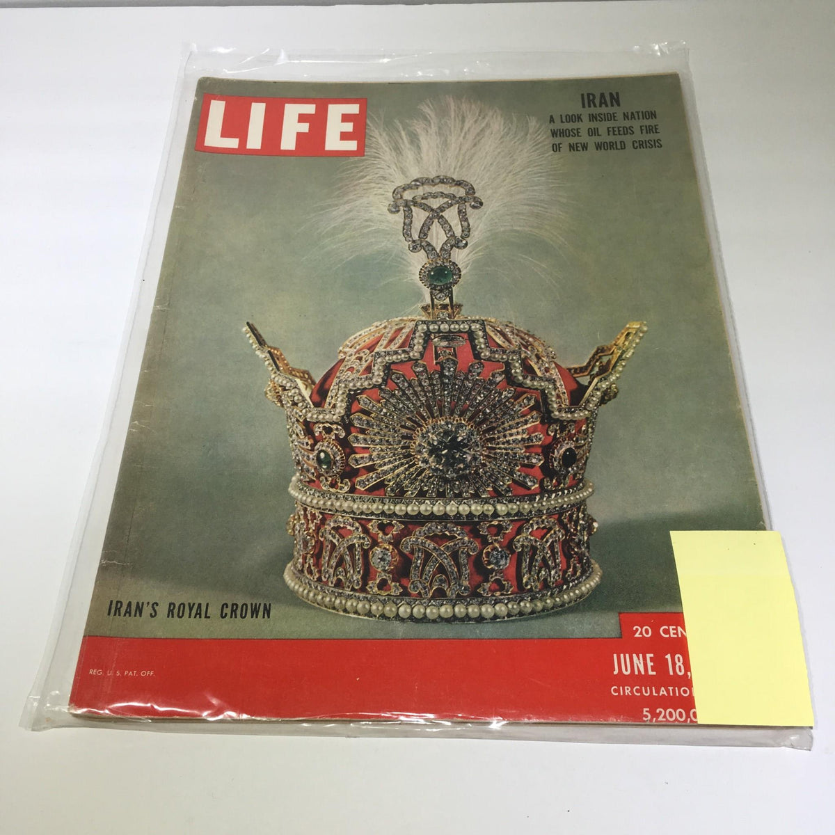 Cover of Life Magazine: June 18, 1951, featuring Iran's Royal Crown, showcasing intricate details of the crown design and vibrant colors against a historical backdrop.