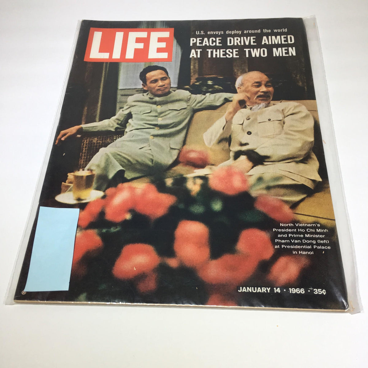 Life Magazine cover from January 14, 1966, featuring North Vietnamese President Ho Chi Minh and Prime Minister Pham Van Dong at the Presidential Palace in Hanoi. The cover highlights the peace drive during the Vietnam War, making it a significant historical collectible.