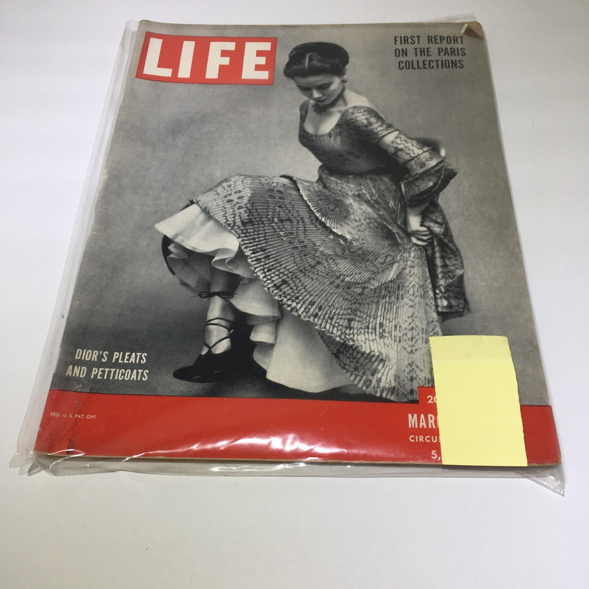 Vintage Life Magazine cover from March 5, 1951, featuring 'Dior's Pleats & Petticoats' showcased at Paris Fashion, highlighting post-war fashion revival.