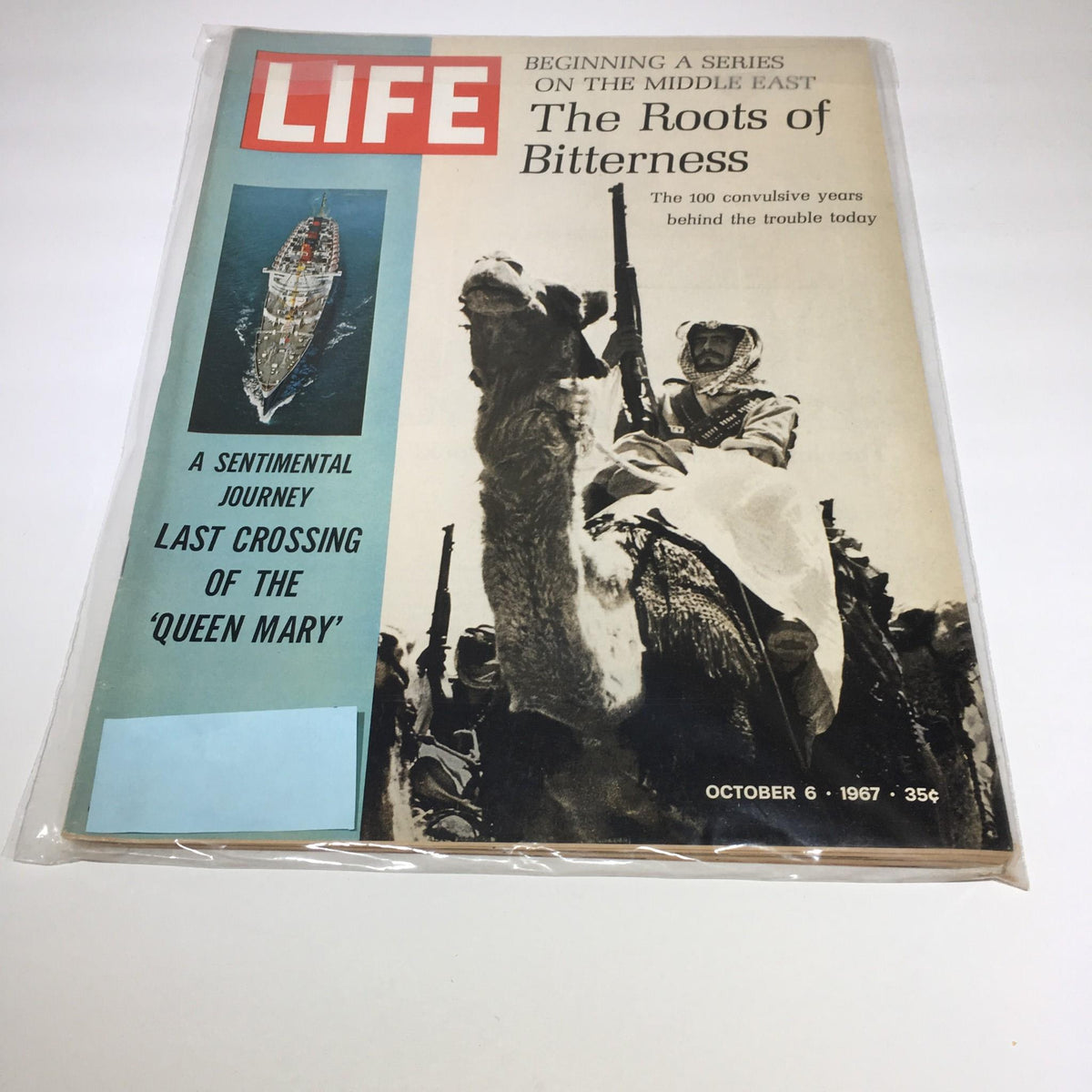 Vintage Life Magazine cover dated October 6, 1967, featuring the series 'The Roots of Bitterness' on the Middle East, with an image of a camel and armed figures. Highlights include a headline on the last crossing of the 'Queen Mary'.