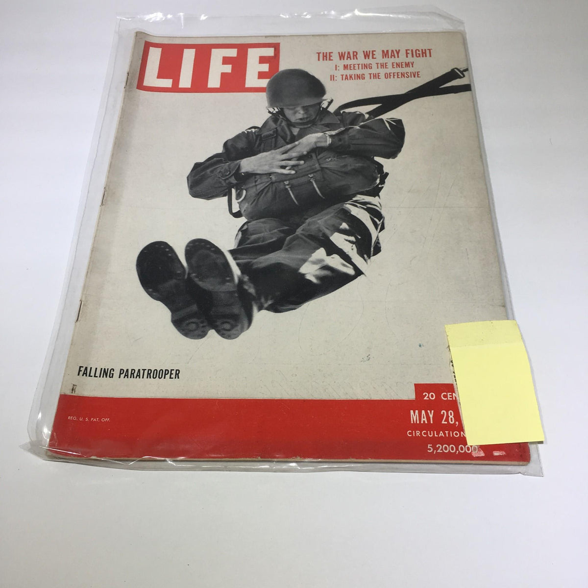 Cover of Life Magazine from May 28, 1951, featuring the striking image of a falling paratrooper, titled 'The War We May Fight.' This vintage magazine captures military life in the 1950s.