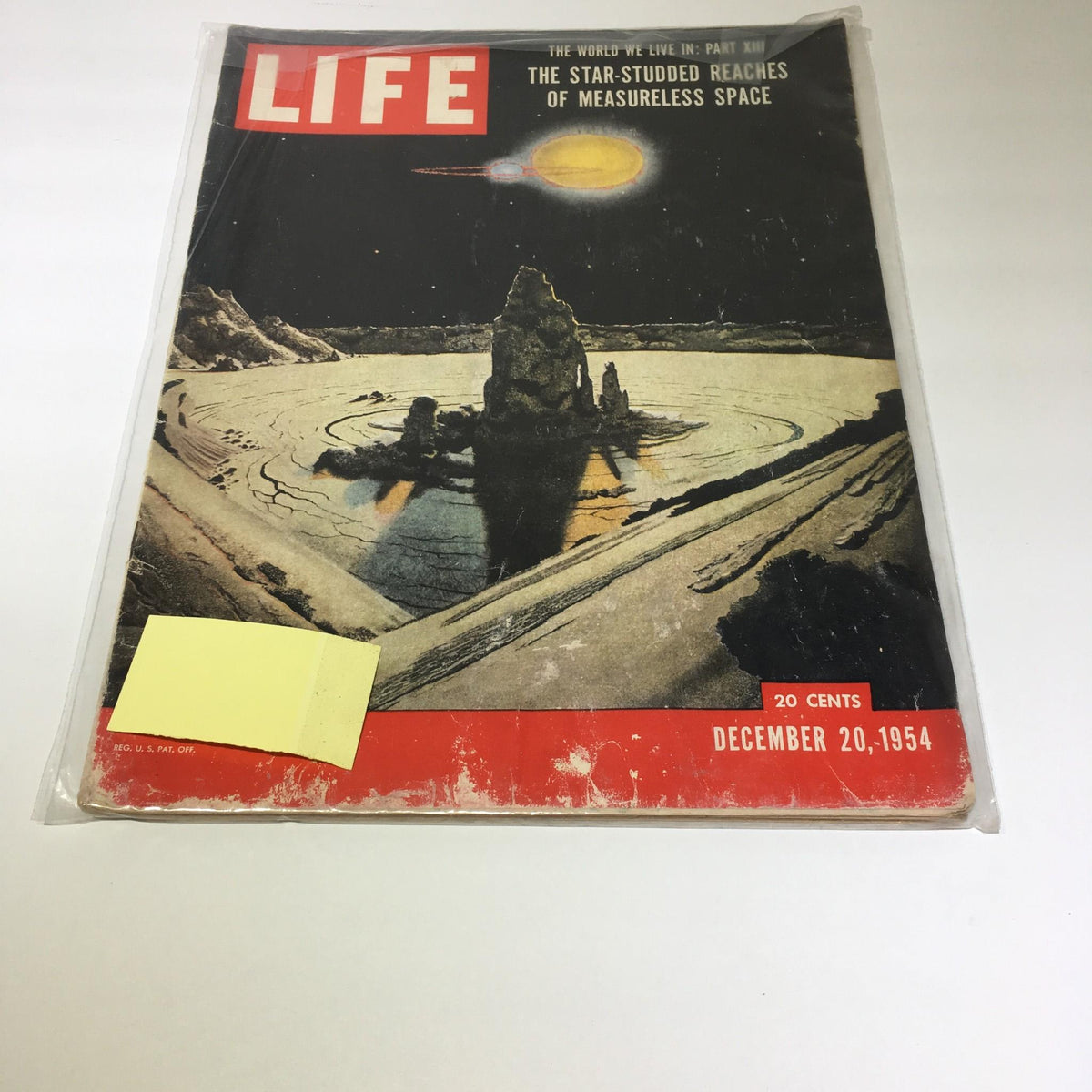 Cover of Life Magazine from December 20, 1954, titled 'Star Studded Reaches of Measureless Space', featuring a scenic space illustration with planets and rocky terrain.