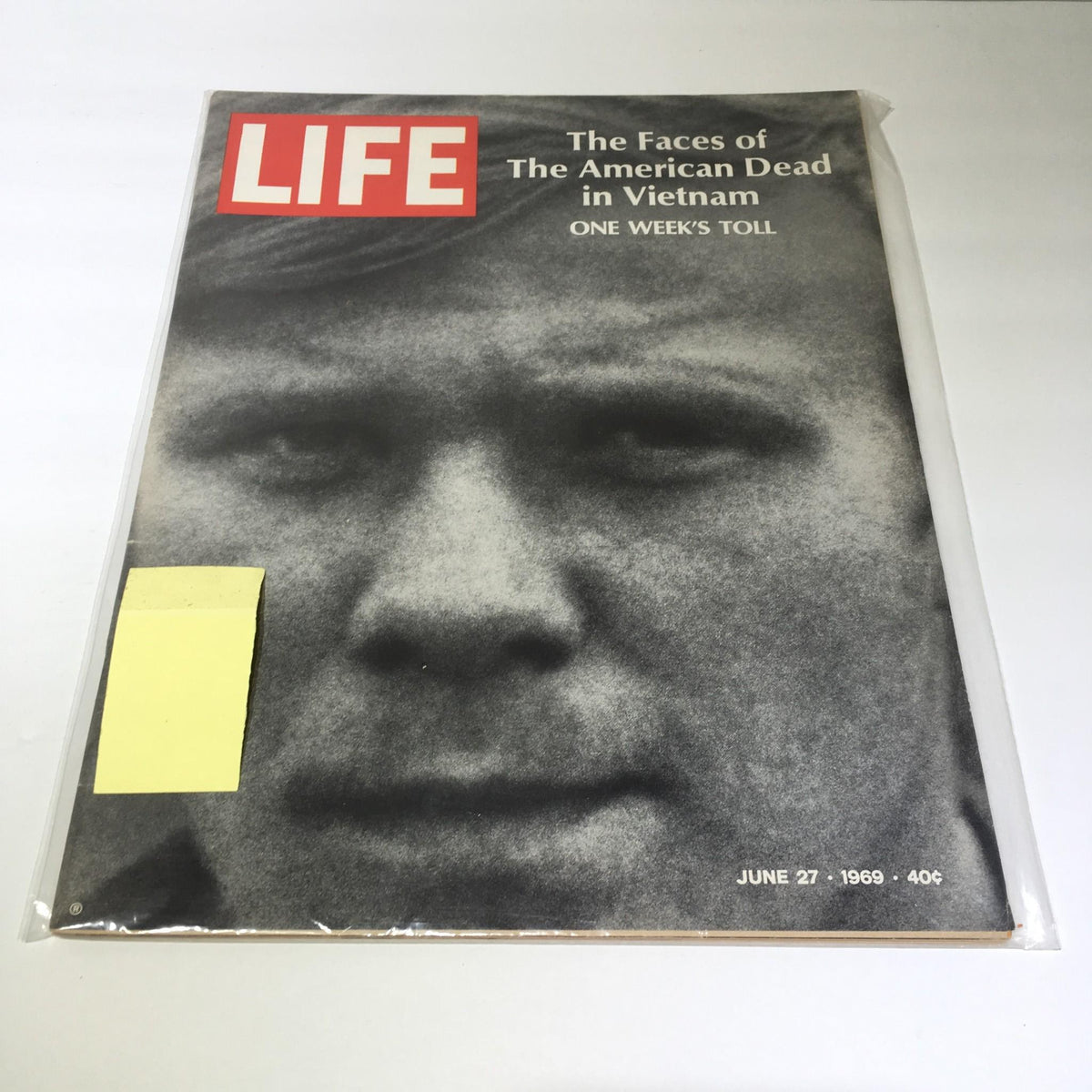 Life Magazine cover from June 27, 1969, featuring the title 'The Faces of The American Dead In Vietnam'. The cover highlights a close-up photograph of a soldier's face, symbolizing the emotional impact of the Vietnam War. A notable issue reflecting on the conflict's realities.