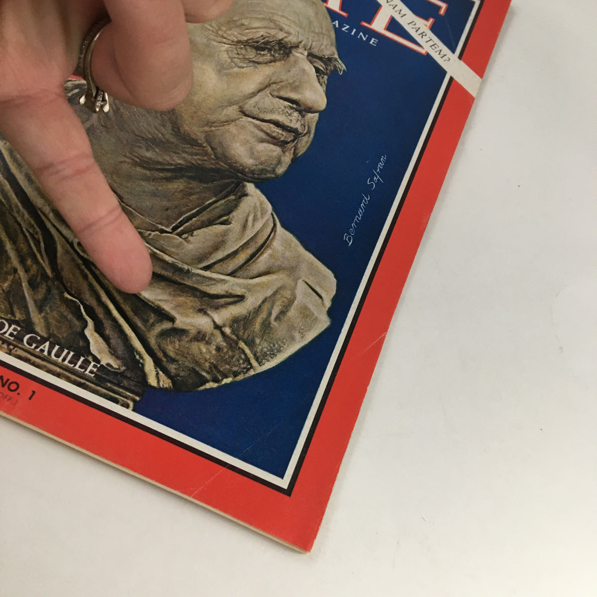 Close-up view of the cover of Time Magazine July 1, 1966, highlighting Charles De Gaulle and the phrase 'Omnis Europa'.