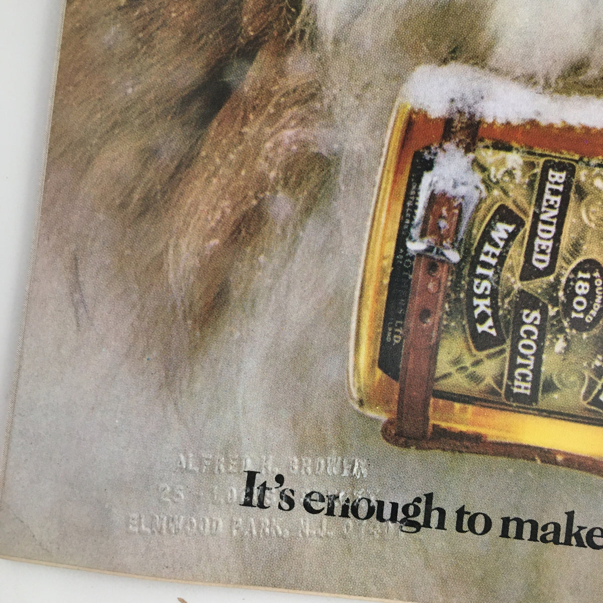 Close-up of a vintage whiskey advertisement featuring a bottle labeled 'Blended Scotch Whisky' and text reading 'It's enough to make.' The image is reminiscent of classic advertisements, adding charm to the Sports Illustrated February 9, 1981 issue featuring Christie Brinkley.