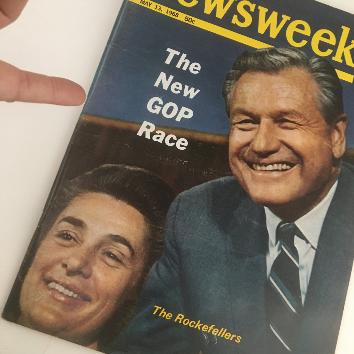 Close-up of the May 13, 1968 Newsweek Magazine cover titled 'The New GOP Race,' showing a hand pointing at the prominent smiling figures, reflecting the political climate of the time.