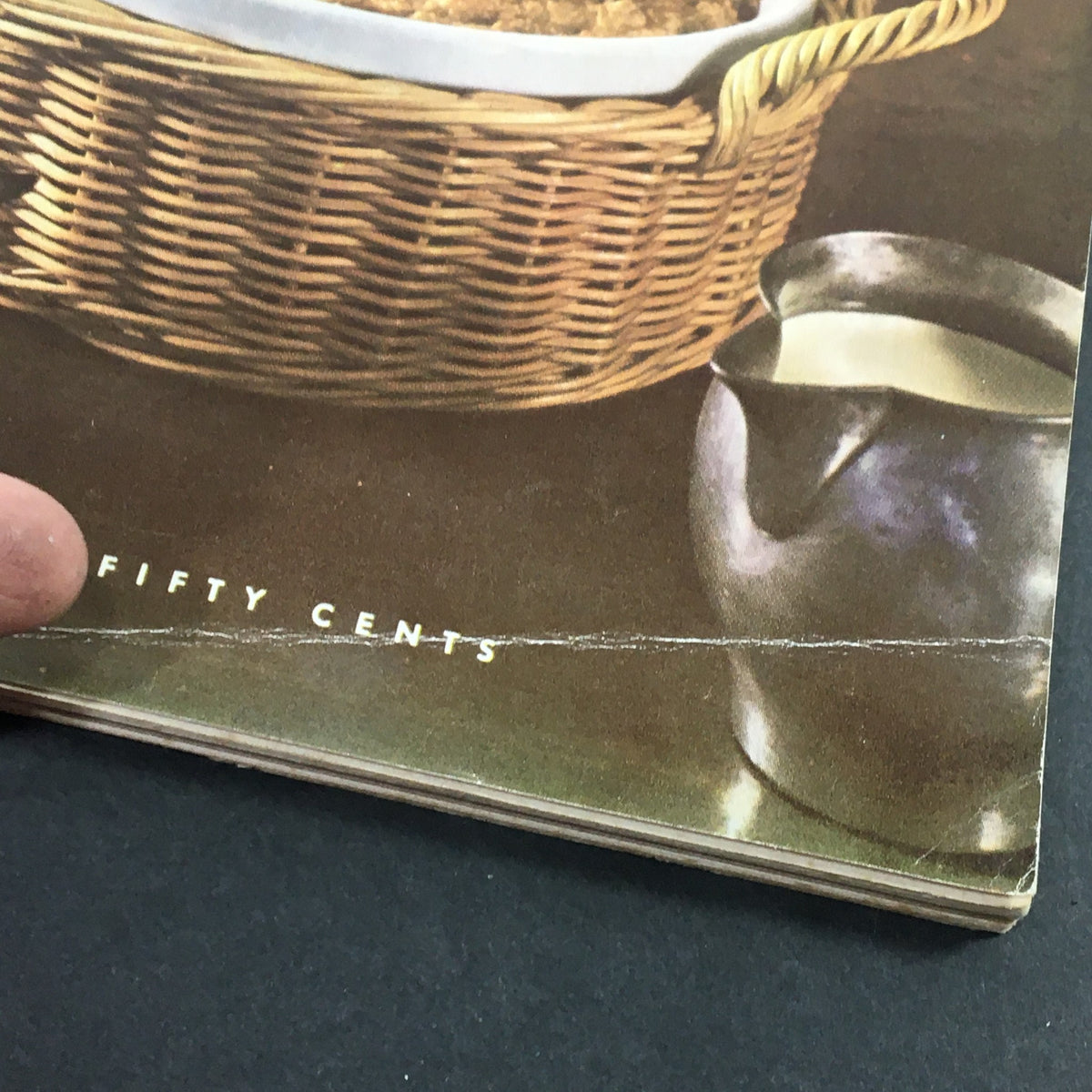 Close-up of the VTG Gourmet Magazine November 1960 cover, highlighting a woven basket with food and a ceramic jug, illustrating vintage culinary art.