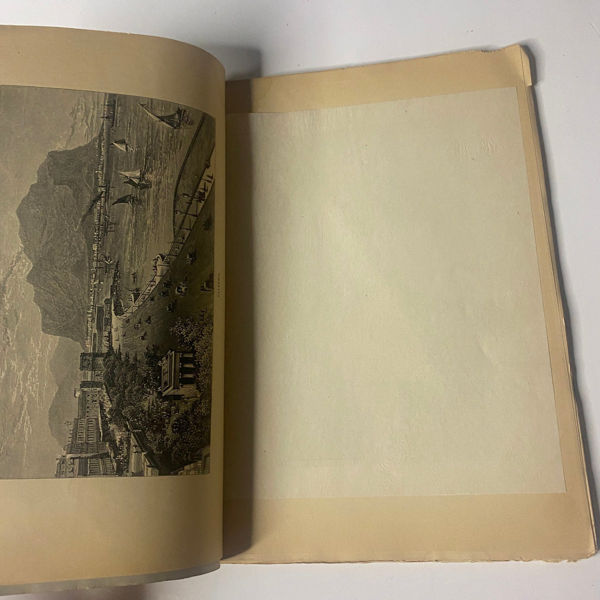 Illustration from 'Around the World with General Grant – Book by John Russell Young, Part Two' depicting a scenic view of a waterfront with mountains.