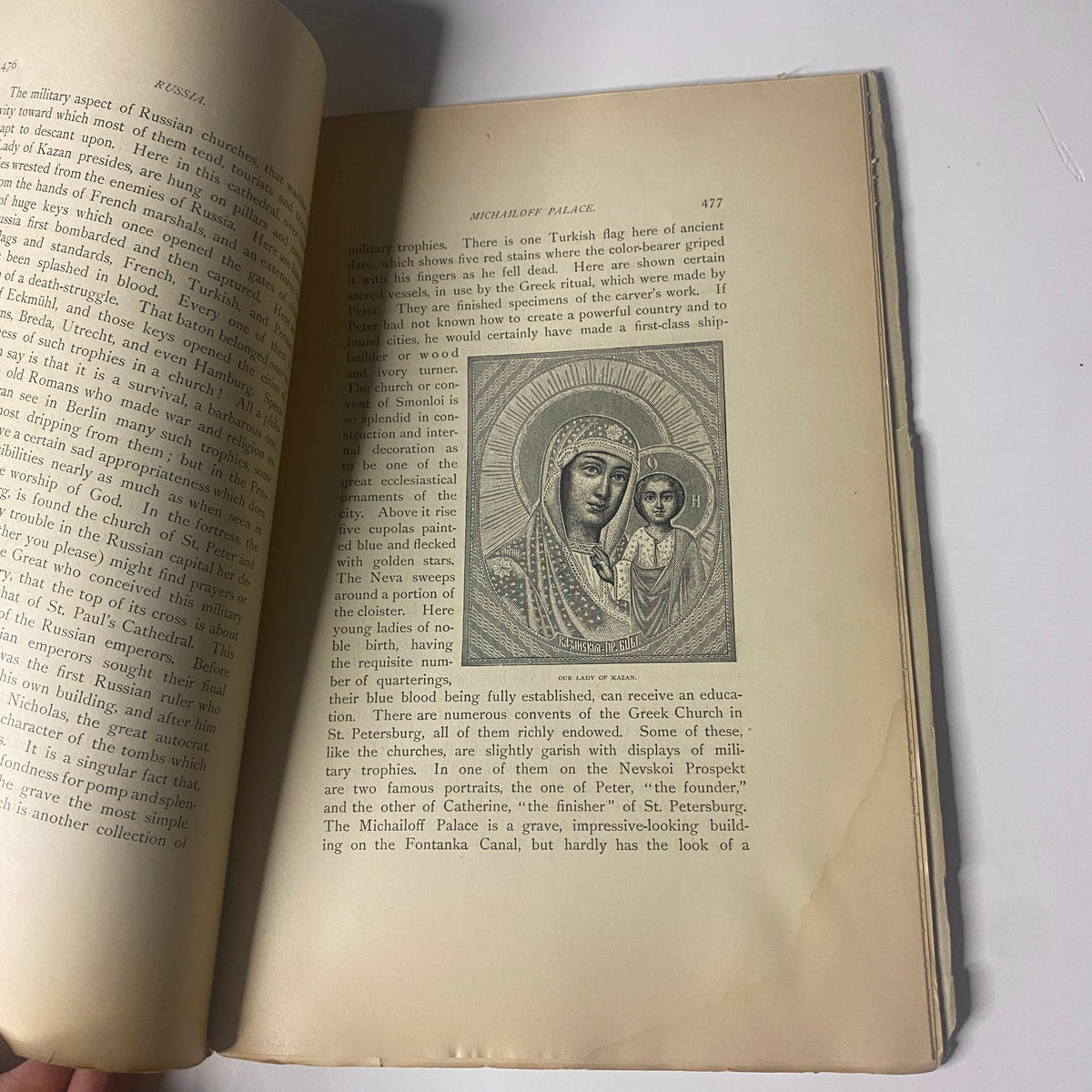 An interior page from 'Around the World with General Grant' by John Russell Young, Part Eight, featuring an illustration of a religious icon, highlighting the book's rich imagery and context.