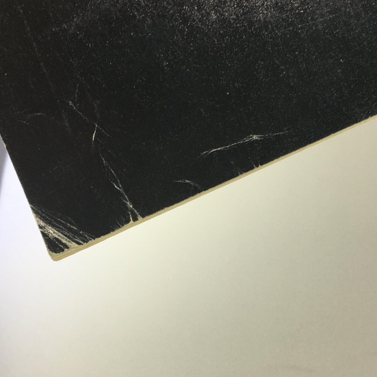 Close-up of the edge of Cinefantastique magazine Volume 13 Number 1, displaying minor wear and imperfections, highlighting its vintage condition.