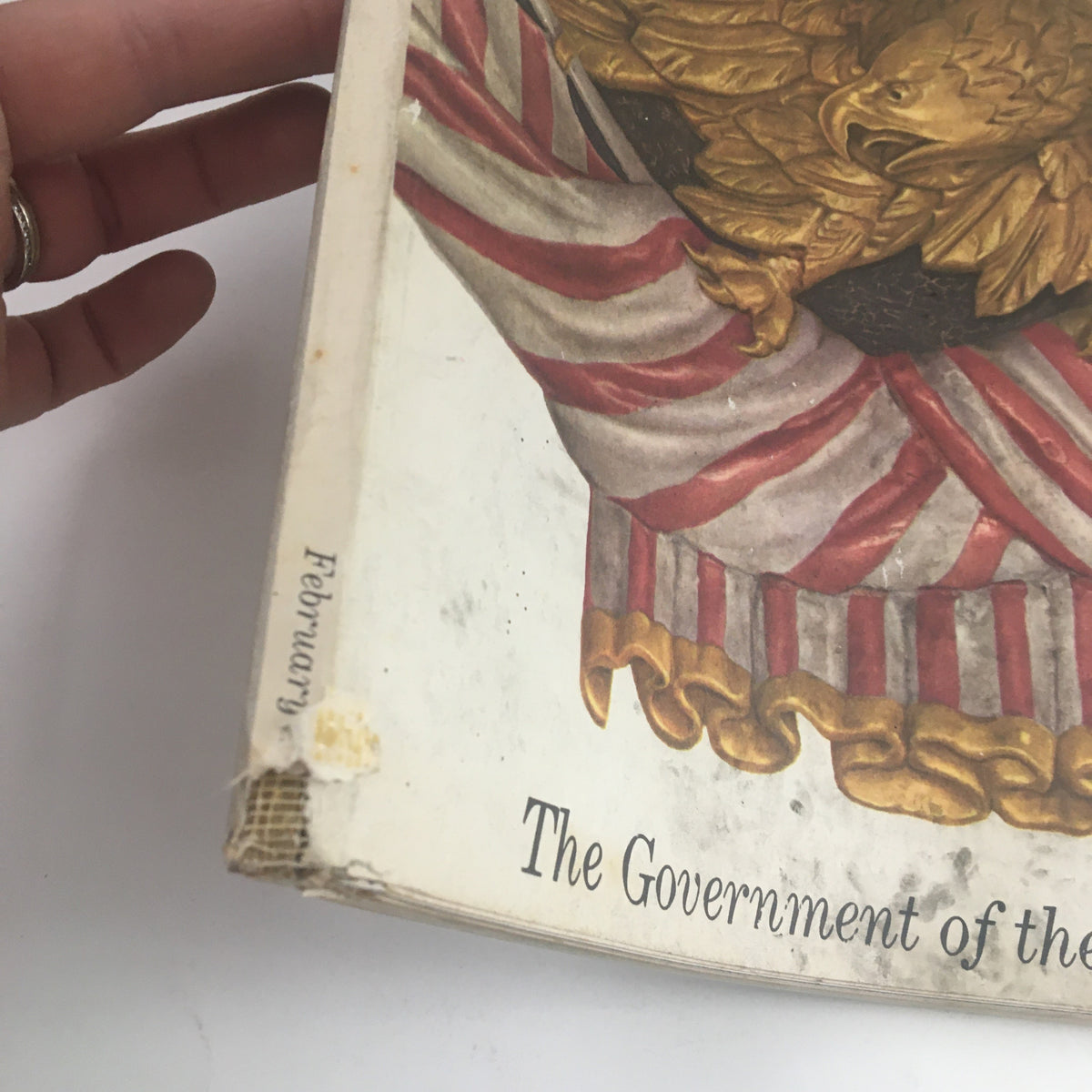 Side view of the February 1952 Fortune Magazine showing the title and wear on the binding, complementing the theme 'The Government of the U.S.A.'.