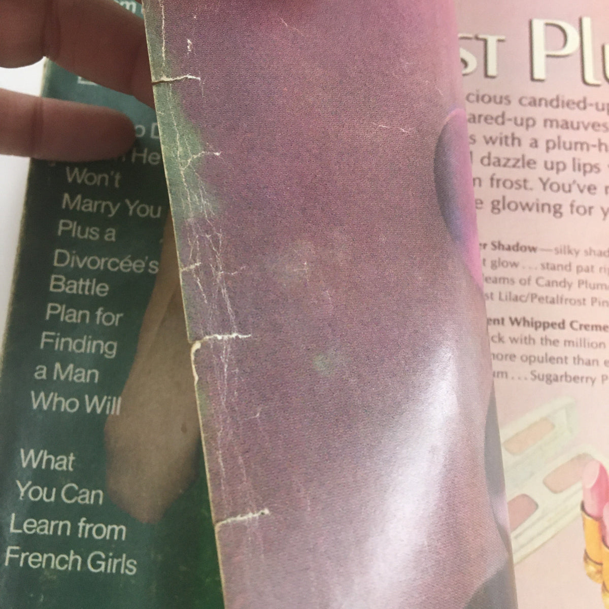 Detail of the Cosmopolitan Magazine October 1971 cover, showing wear and tear typical of vintage magazines.