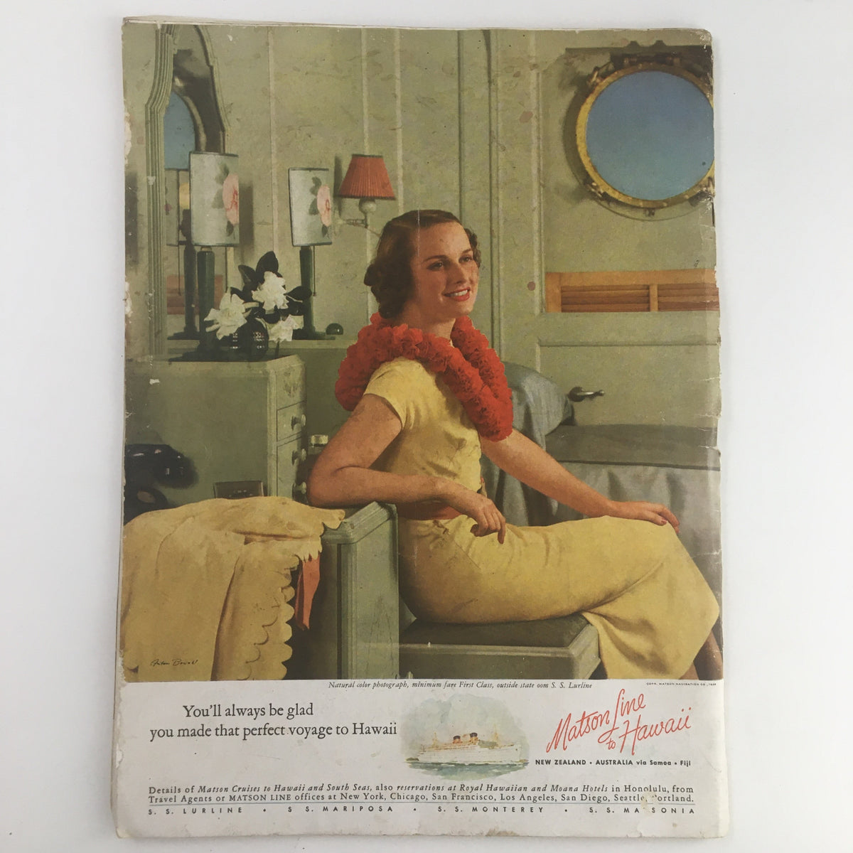 Back cover of Scribner's Magazine June 1938 Vol. 103 No. 6 featuring an advertisement for Matson Line to Hawaii, depicting a woman adorned with a floral lei, showcasing travel and luxury.
