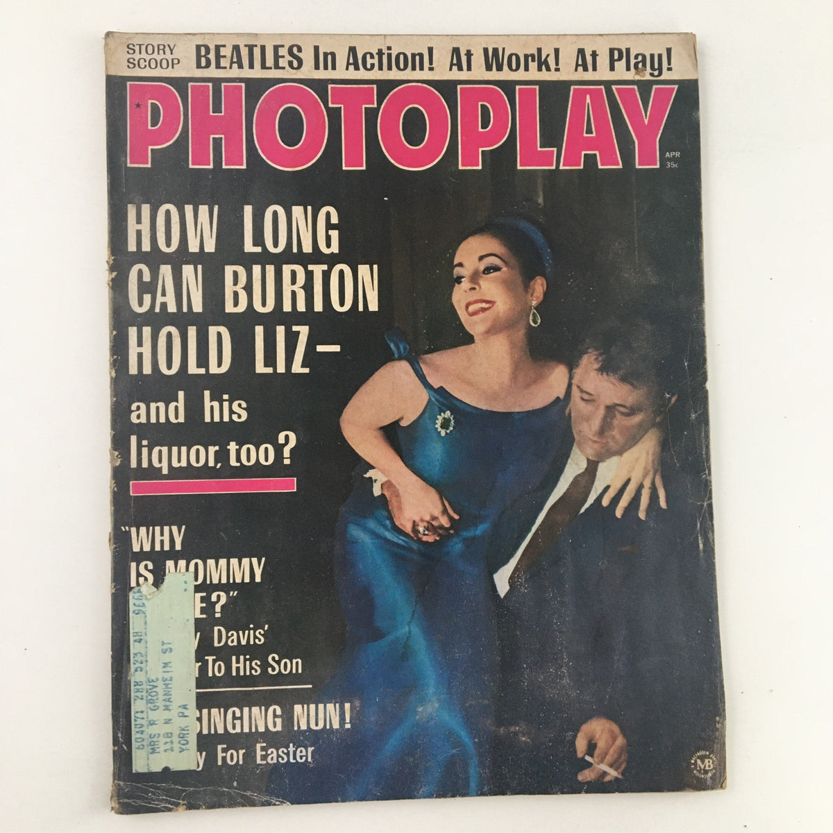 Cover of Photoplay Magazine April 1964 featuring Elizabeth Taylor and Richard Burton, showcasing the headline about their relationship and iconic Hollywood style.