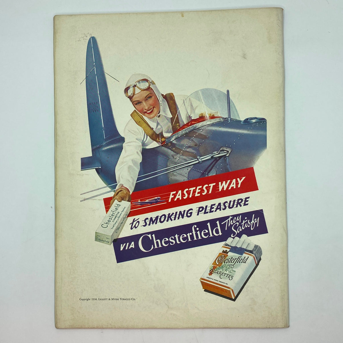 Vintage advertisement from The New Yorker Complete Magazine September 17, 1938 featuring a stylish female pilot holding a Chesterfield cigarette pack with the text 'Fastest Way to Smoking Pleasure' prominently displayed.