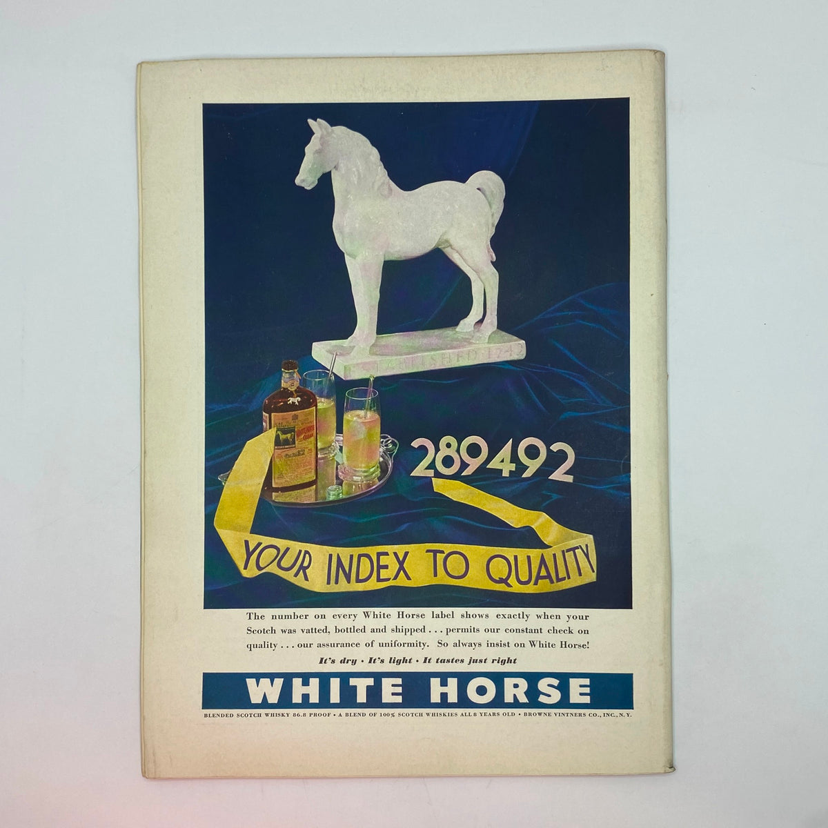 Advertisement for White Horse Scotch Whisky from The New Yorker Complete Magazine October 8, 1938, featuring a horse statue and drinks, emphasizing quality and style.