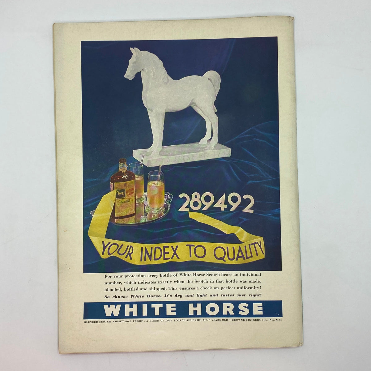 Vintage advertisement from The New Yorker magazine dated November 12, 1938 for White Horse Scotch, featuring a decorative white horse figure and highlighting the whiskey's quality.
