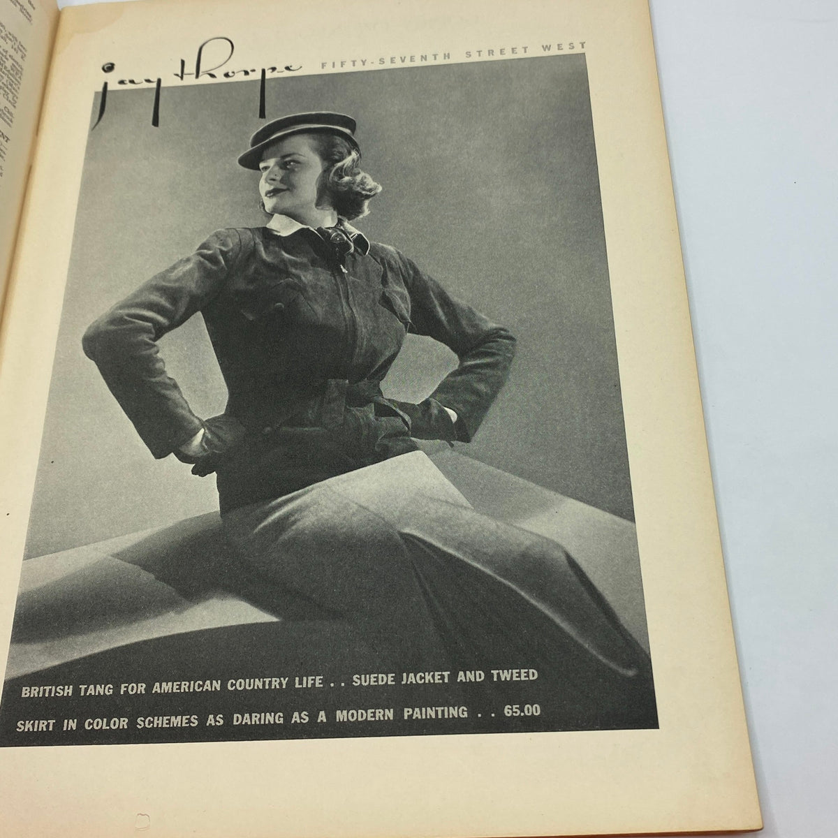 Advertisement page from The New Yorker Complete Magazine March 20, 1937 featuring a model in a suede jacket and tweed skirt for British Tang, highlighting classic fashion of the era.