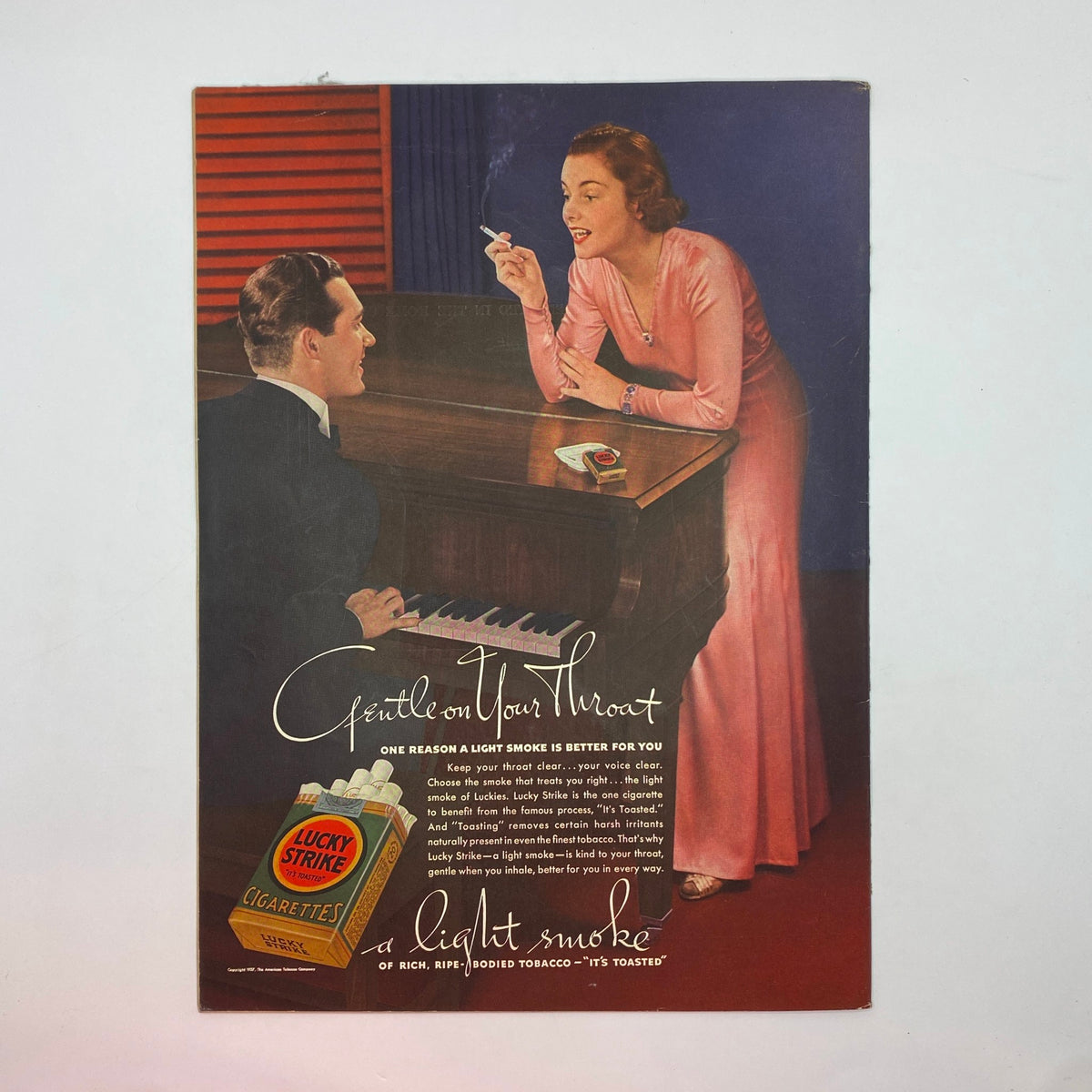 Artwork from The New Yorker Complete Magazine January 30, 1937 featuring a man at a piano and a woman in a pink dress, promoting Lucky Strike cigarettes with the tagline 'Gentle on Your Throat'.