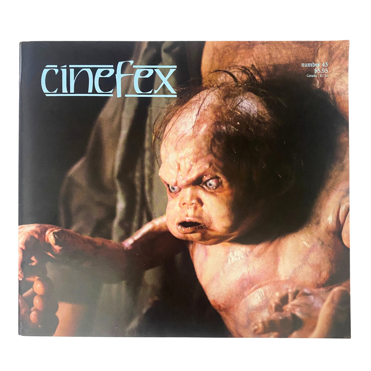 Cinefex Magazine August 1990 No. 43 cover featuring a striking image of Kuato, the rebel leader from Total Recall, showcasing the innovative makeup effects inside.