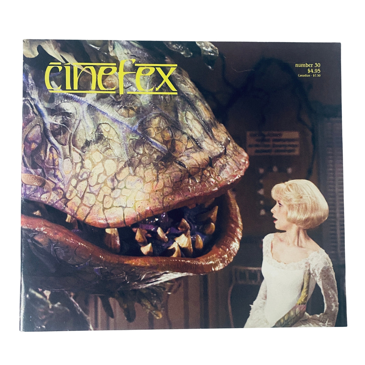 Cover of Cinefex Magazine May 1987 No. 30 featuring the iconic plant Audrey II from Little Shop of Horrors with a female character.