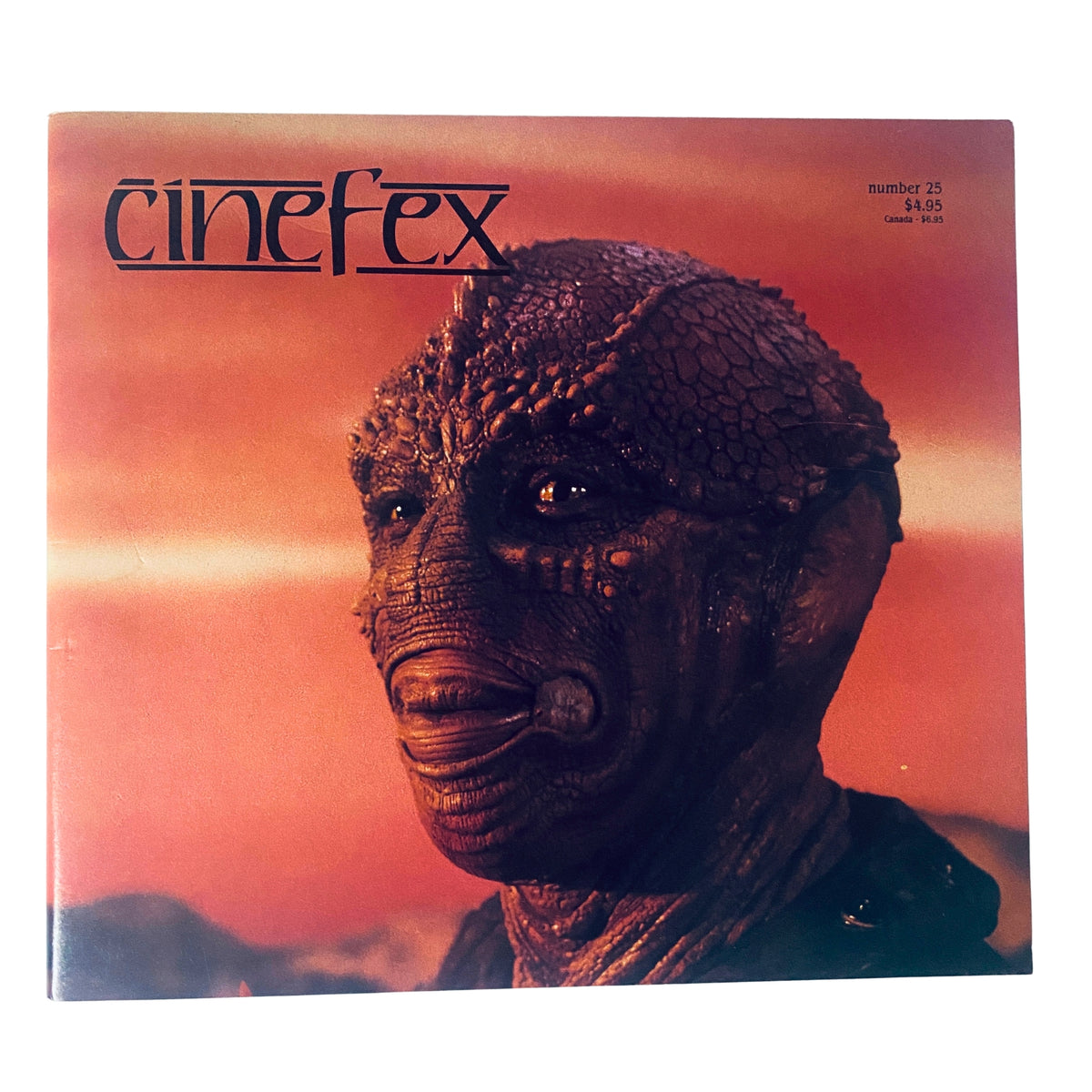 Cover of Cinefex Magazine February 1986 Issue No. 25 featuring the alien character Jeriba Shigan from the film Enemy Mine, showcasing a dramatic sunset backdrop related to special effects in cinema.