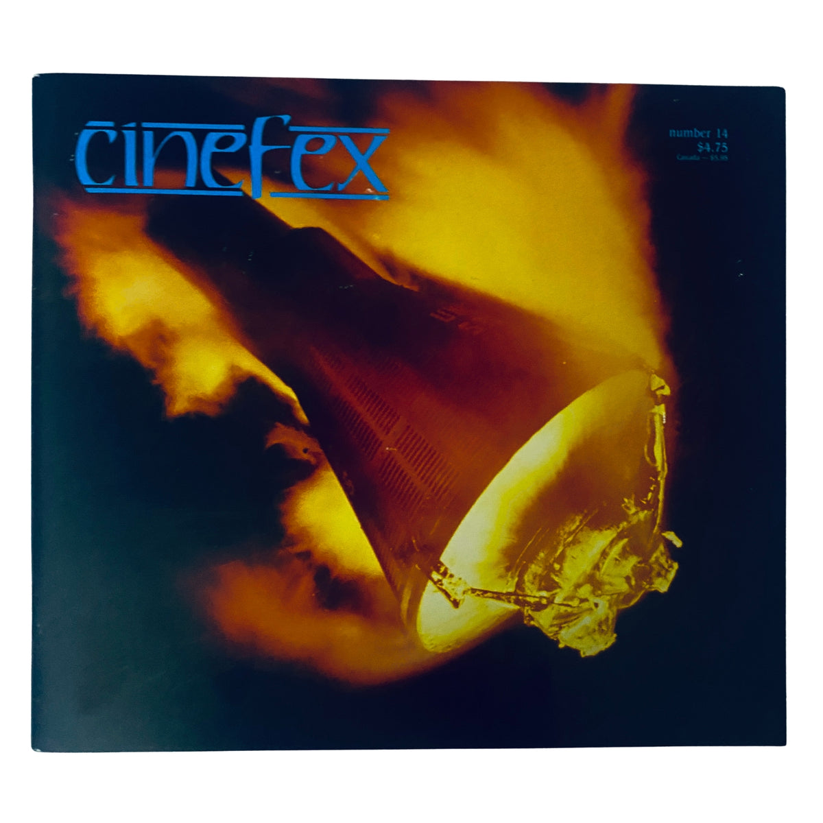 Cinefex Magazine October 1983 No. 14 cover featuring a dramatic image of a capsule during fiery reentry, related to the film The Right Stuff.