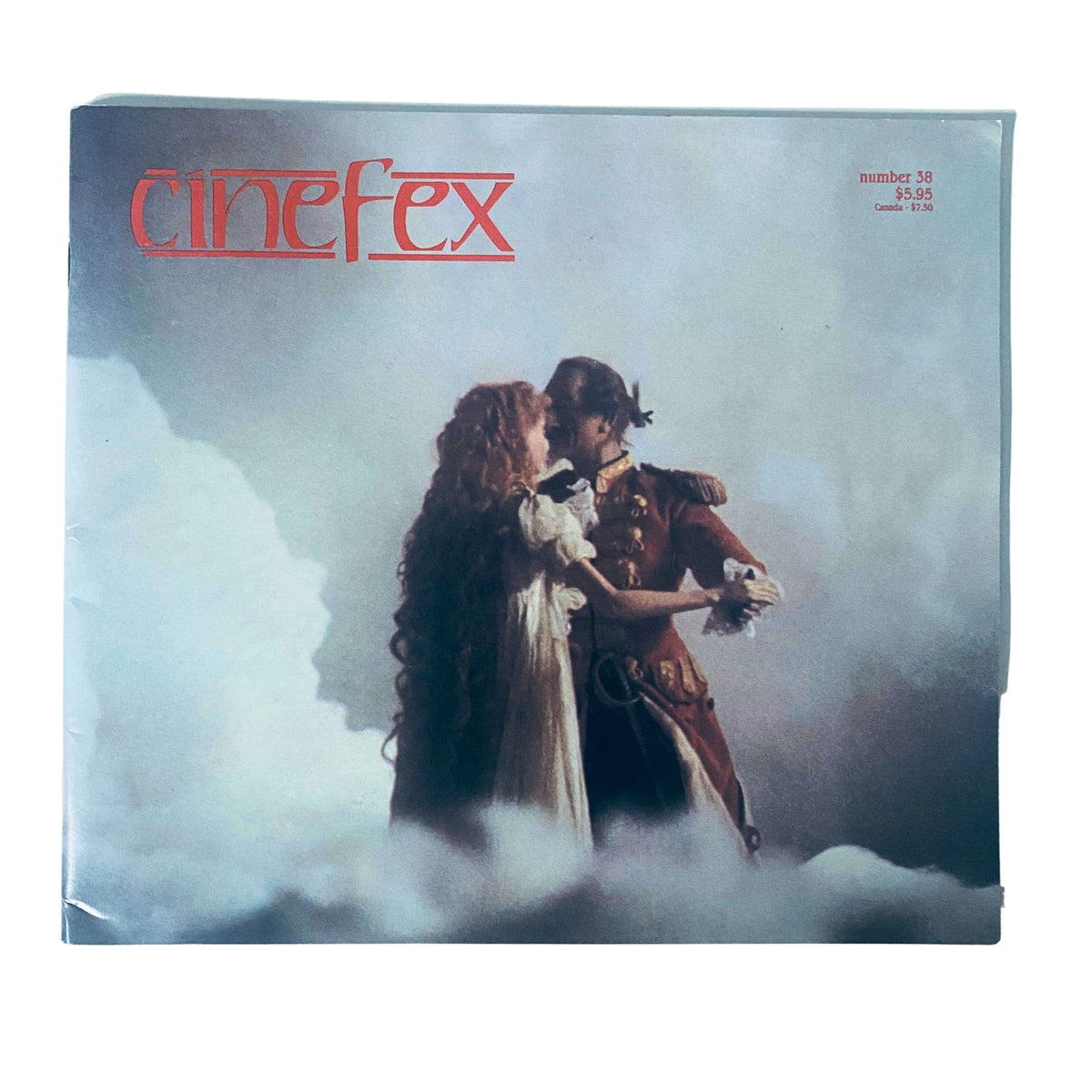 Cinefex Magazine May 1989 No. 38 cover featuring a romantic scene with characters in costume among clouds from The Adventures of Baron Munchausen.