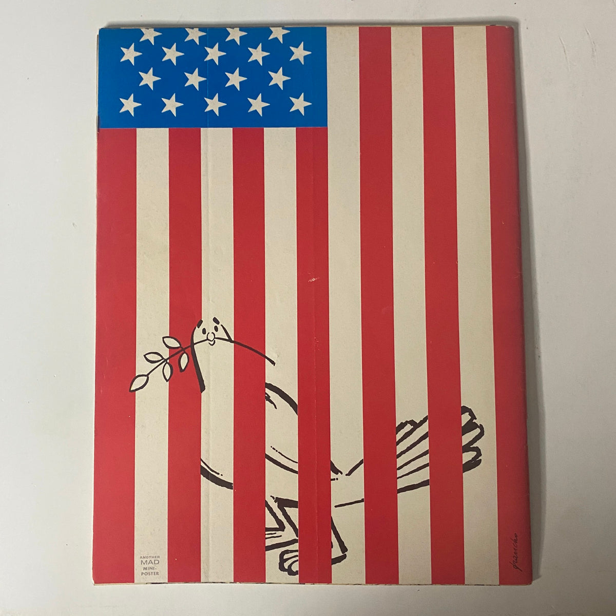 Back cover of Mad Magazine June 1972, Issue No. 151, displaying a simplified American flag design with a cartoon bird holding an olive branch.
