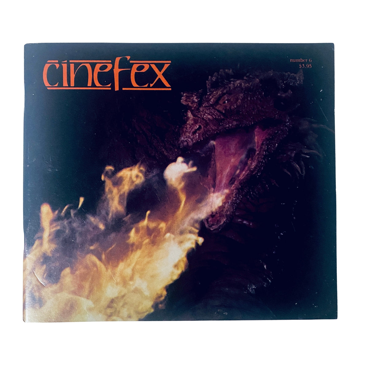 Cinefex Magazine October 1981 No. 6 Dragonslayer cover showcasing the iconic dragon Vermithrax Pejorative spewing fire, featuring vibrant colors and dramatic imagery.