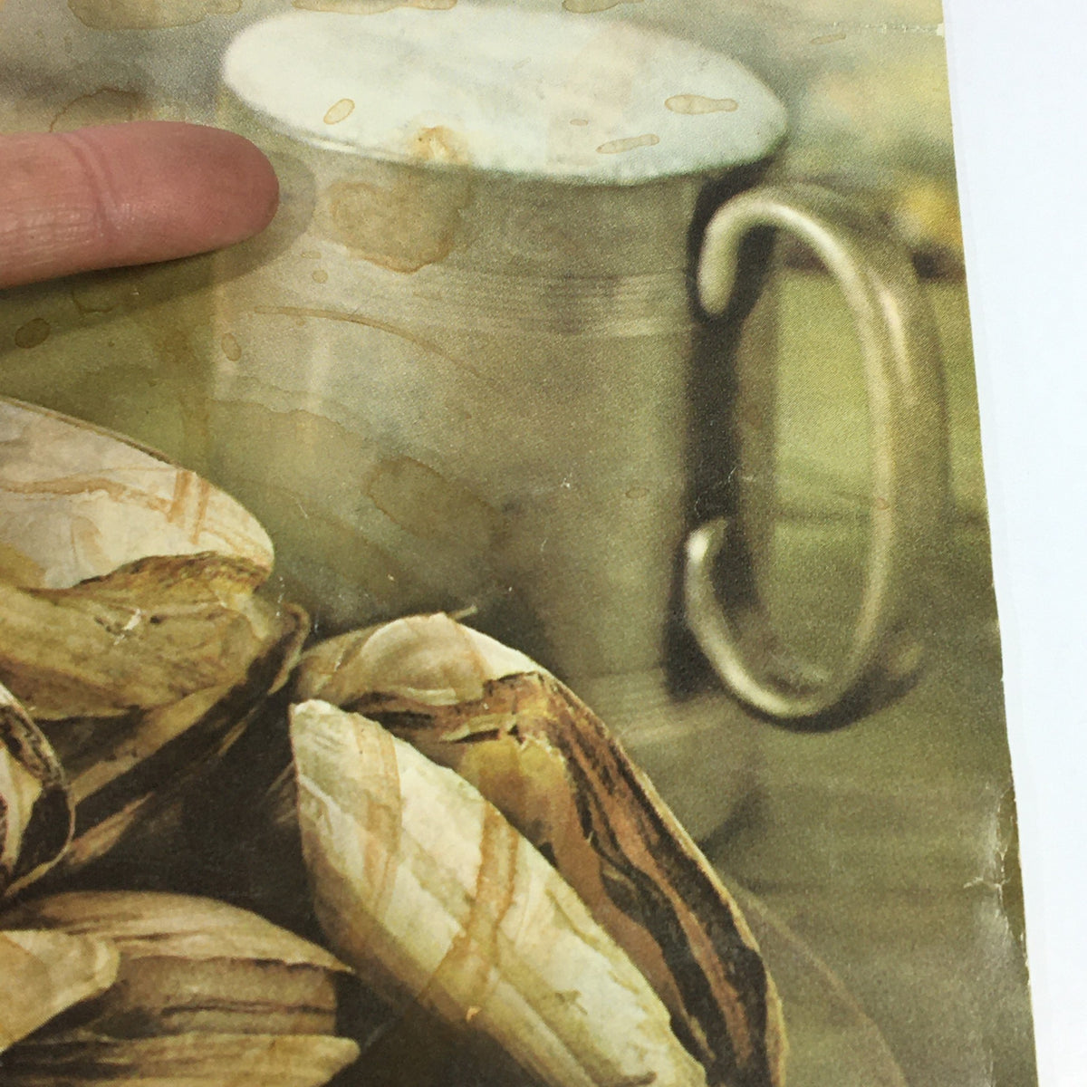 Close-up of a vintage food illustration featuring almond pastries and a metal cup from the VTG Gourmet The Magazine of Good Living June 1963 issue, highlighting gourmet dining aesthetics.