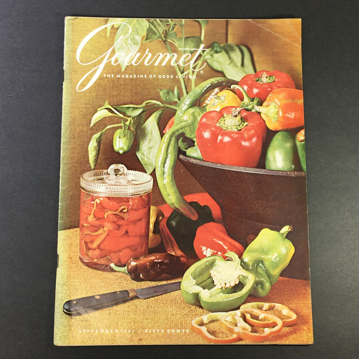 Cover of VTG Gourmet The Magazine of Good Living, September 1963, featuring vibrant bell peppers and a jar of pickled vegetables, showcasing a culinary theme.