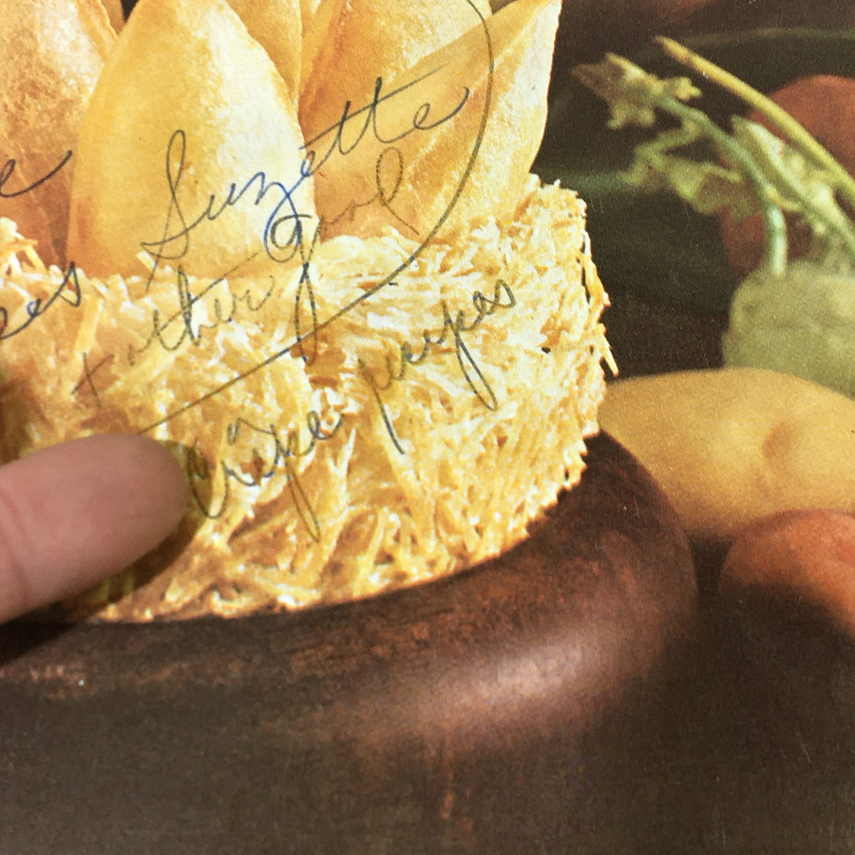 Detailed view of the dessert on the cover of VTG Gourmet Magazine, emphasizing the Crêpes Suzette and vintage handwriting.
