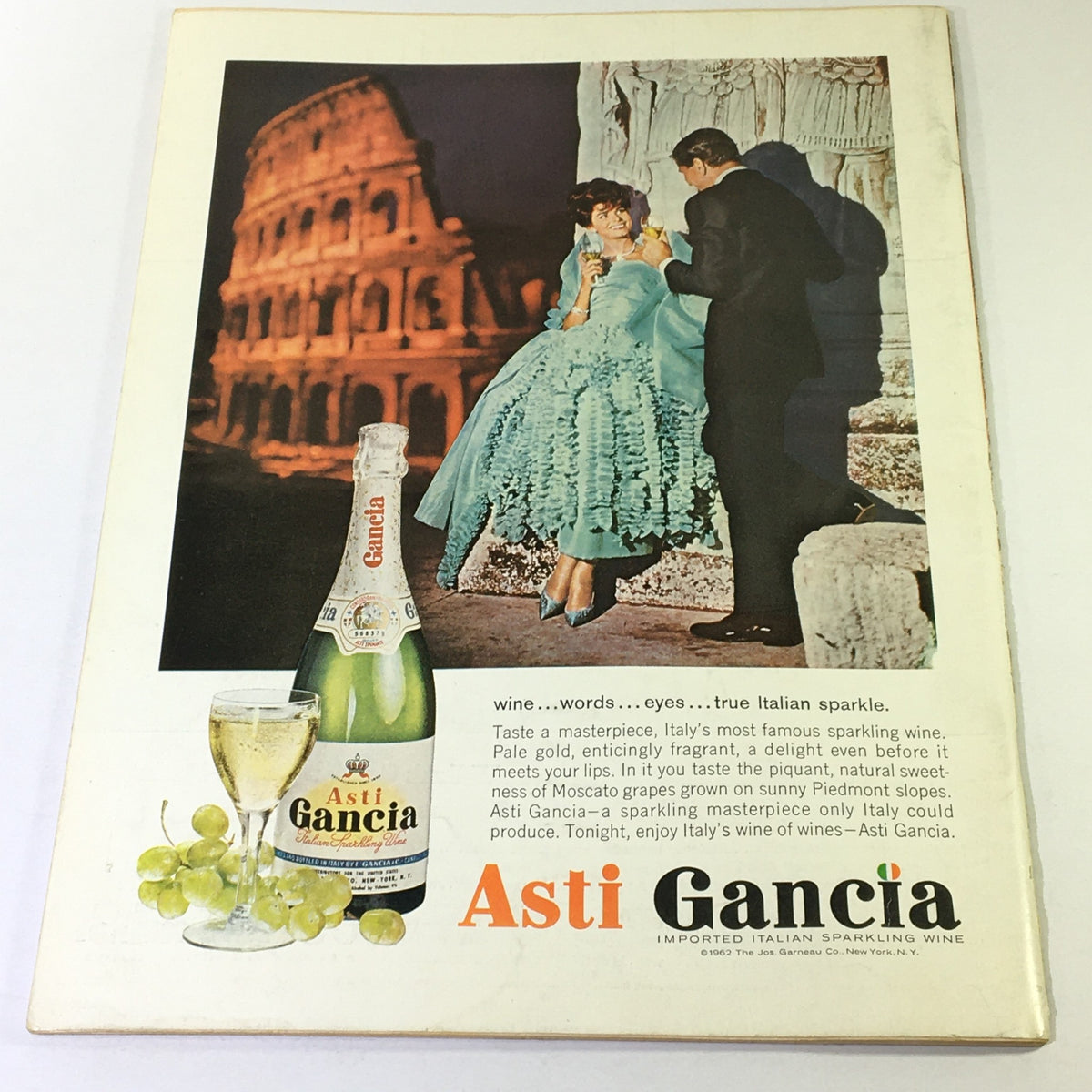 Back cover of the VTG Gourmet Magazine of Good Living, March 1963, promoting Asti Gancia sparkling wine with a romantic scene in front of historical architecture.