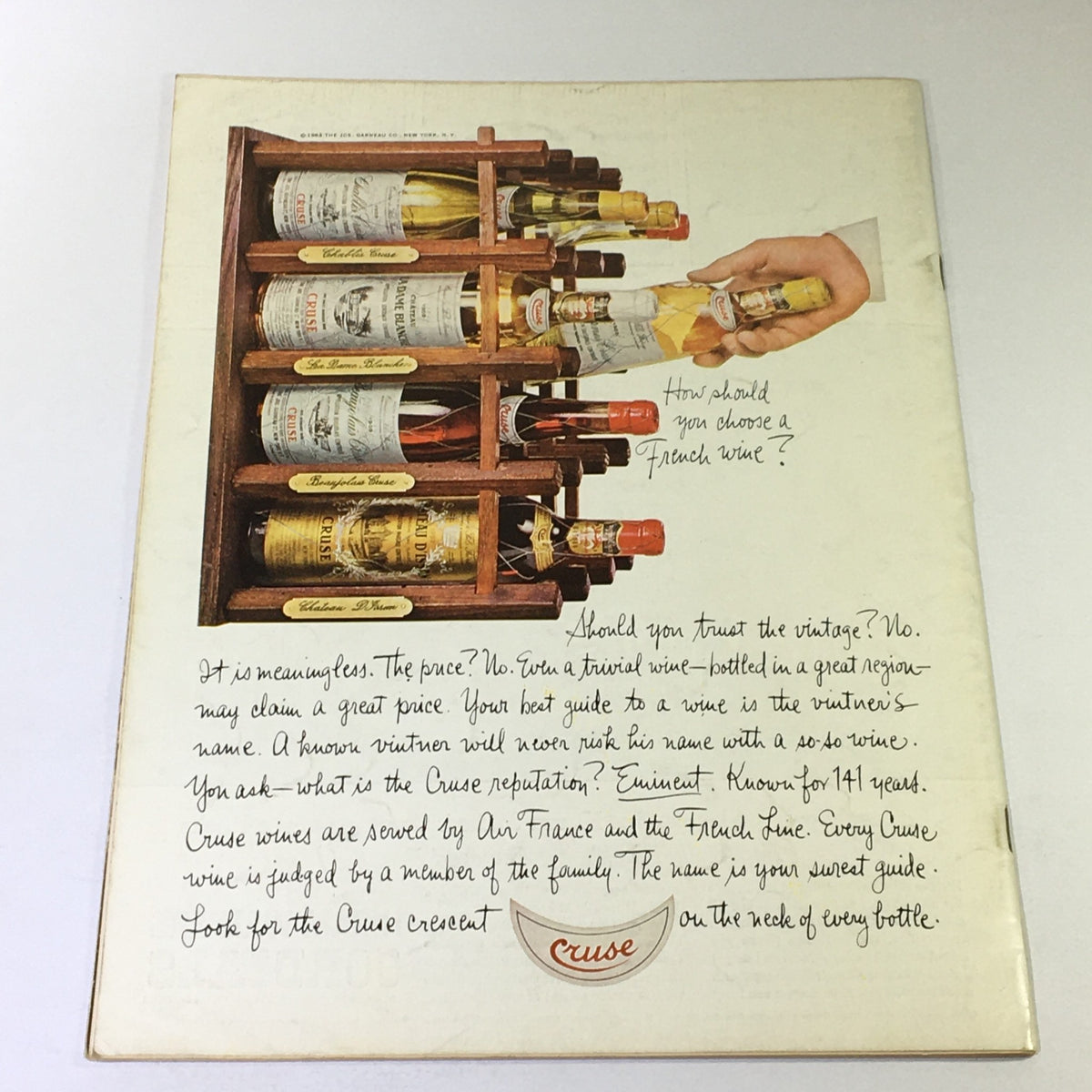 Back cover of Vintage Gourmet Magazine - July 1963 showcasing wine bottles with informative text about choosing French wines.