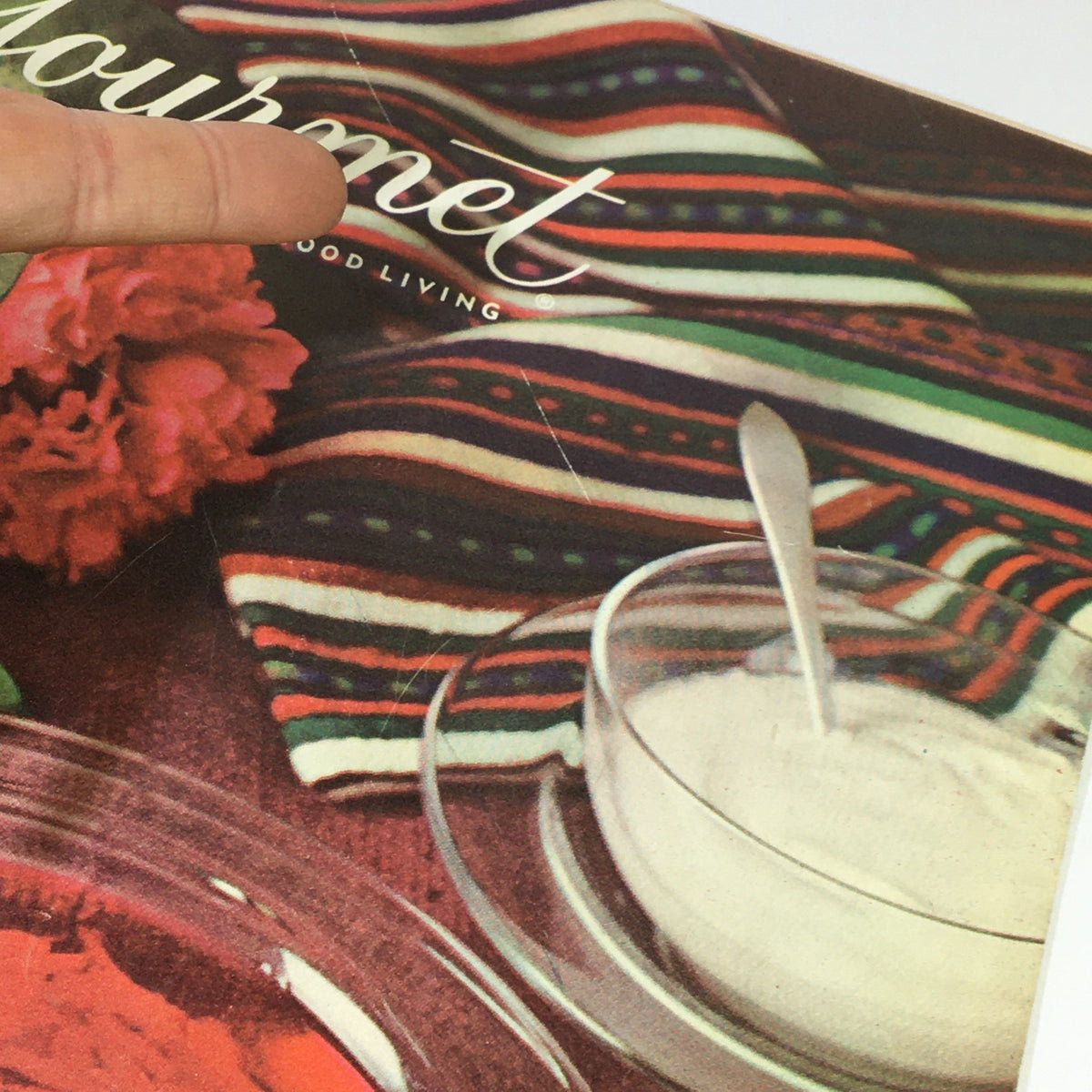 Cover of VTG Gourmet Magazine July 1963, featuring a beautifully styled food scene with a colorful plate, a flower, and culinary elements, titled 'Happiness is Warm Croissant.'