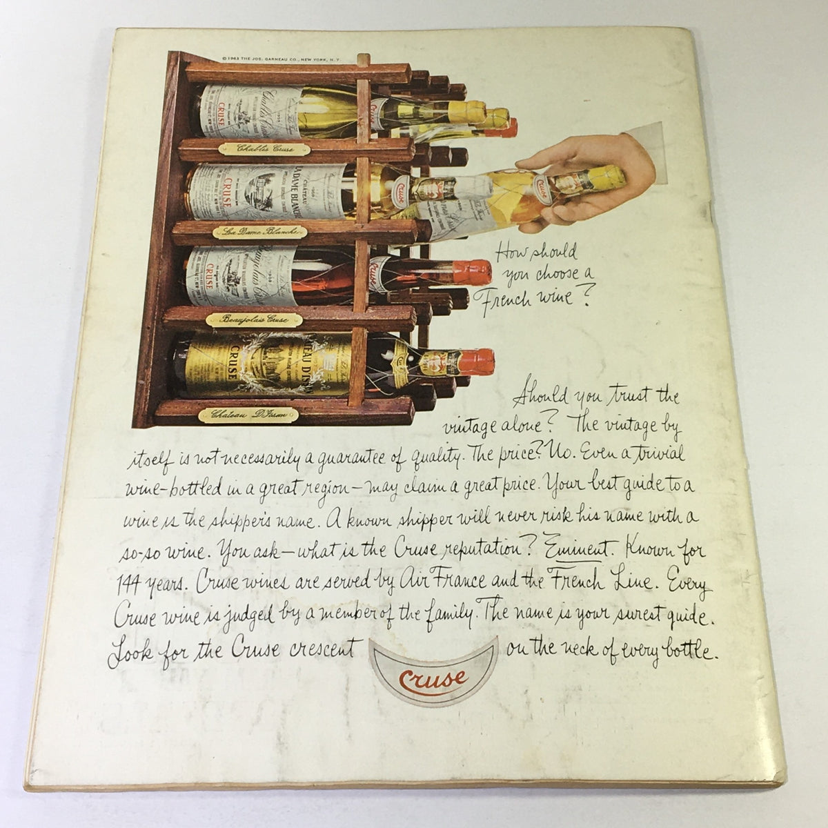 Back cover of VTG Gourmet The Magazine of Good Living, March 1964, displaying an assortment of wine bottles and a guide to choosing French wine.