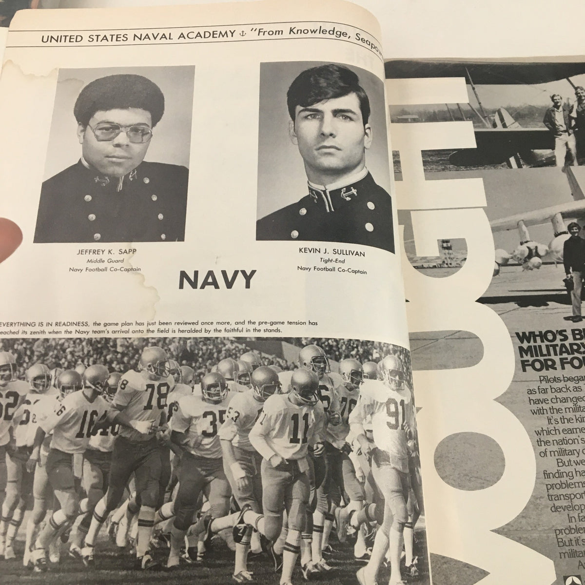 Navy leadership page from the 1976 Navy Boston College Navy-Marine Corps Memorial Stadium Program featuring photos of co-captains Jeffrey K. Sarp and Kevin J. Sullivan.