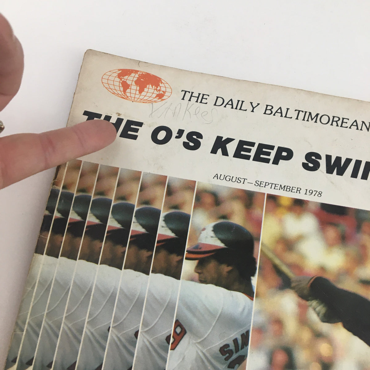 Cover page of the 1978 The Daily Baltimorean The O's Keep Swinging Official Program, featuring the title and a hand pointing to it.