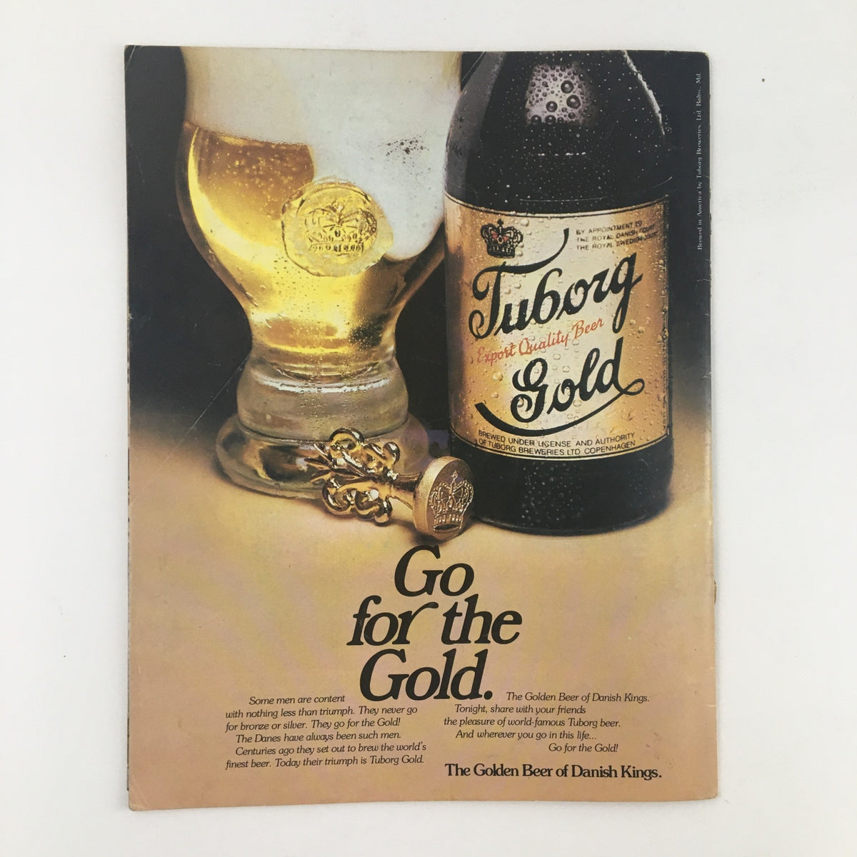 Back cover of 1978 The Daily Baltimorean The O's Keep Swinging Official Program advertising Tuborg Gold beer with a glass and keychain.