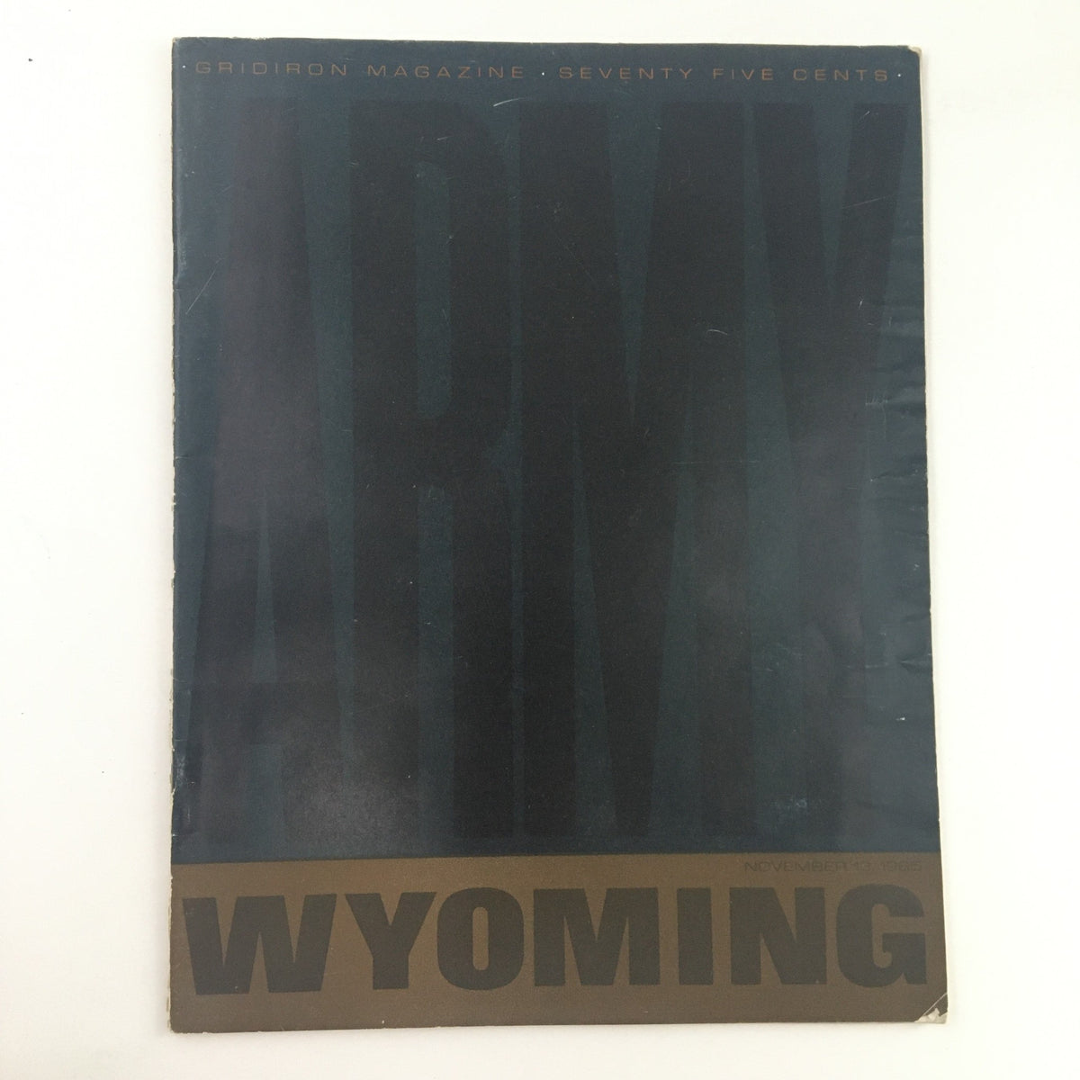 Cover of Gridiron Magazine November 13 1965 featuring 'Strength of Black Knights Wyoming'. A vintage magazine showcasing sports history.