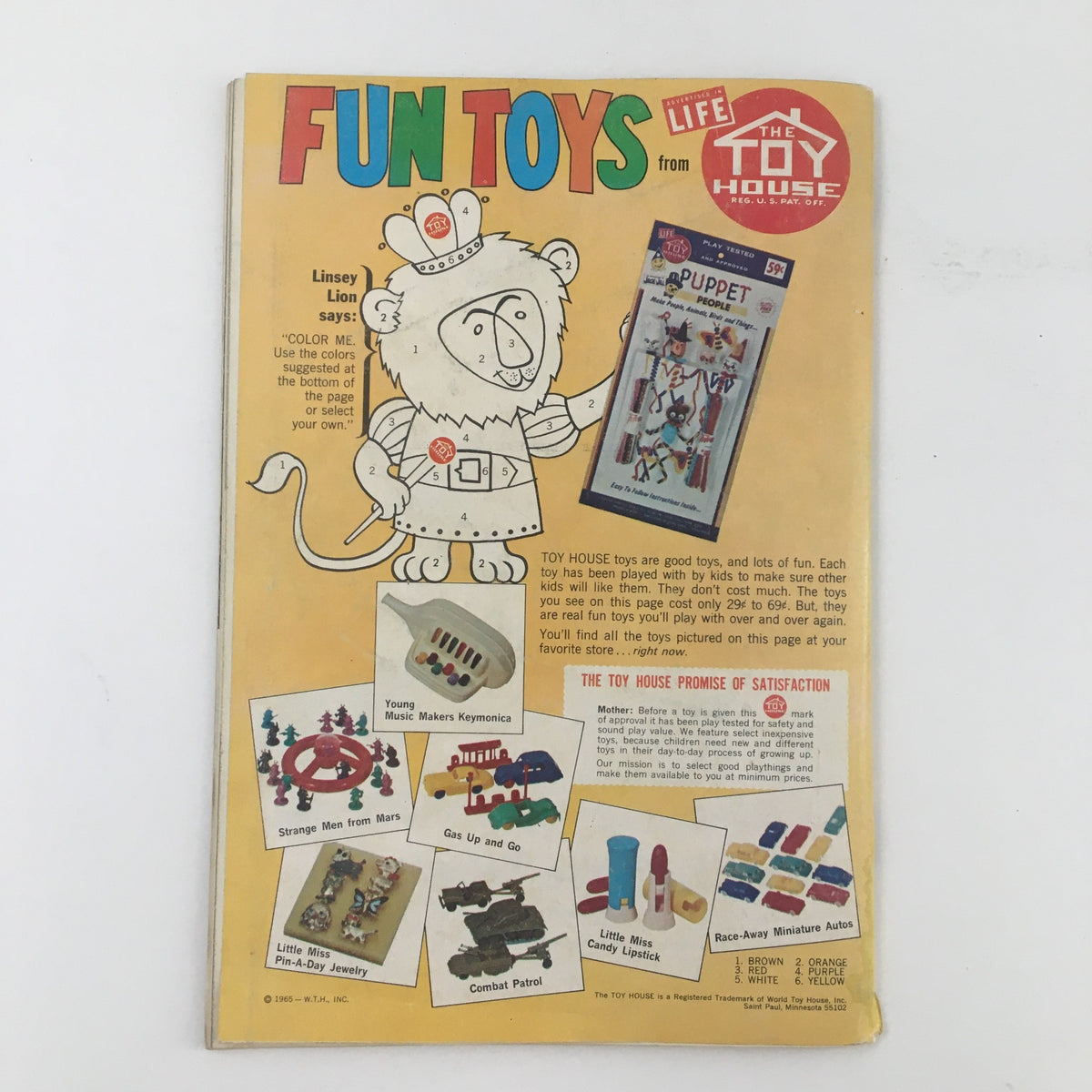Back cover of Jack and Jill Magazine November 1965 showing toys and products from The Toy House, featuring vibrant illustrations and advertisements for children's toys.