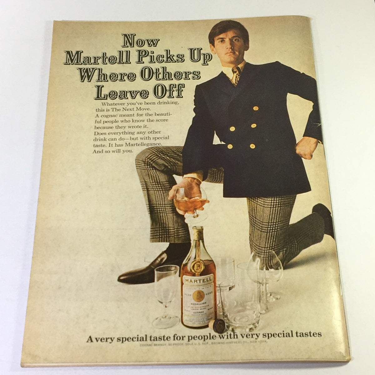 Advertisement page from VTG Gourmet The Magazine of Good Living March 1967 featuring a man in a suit promoting Martell cognac.