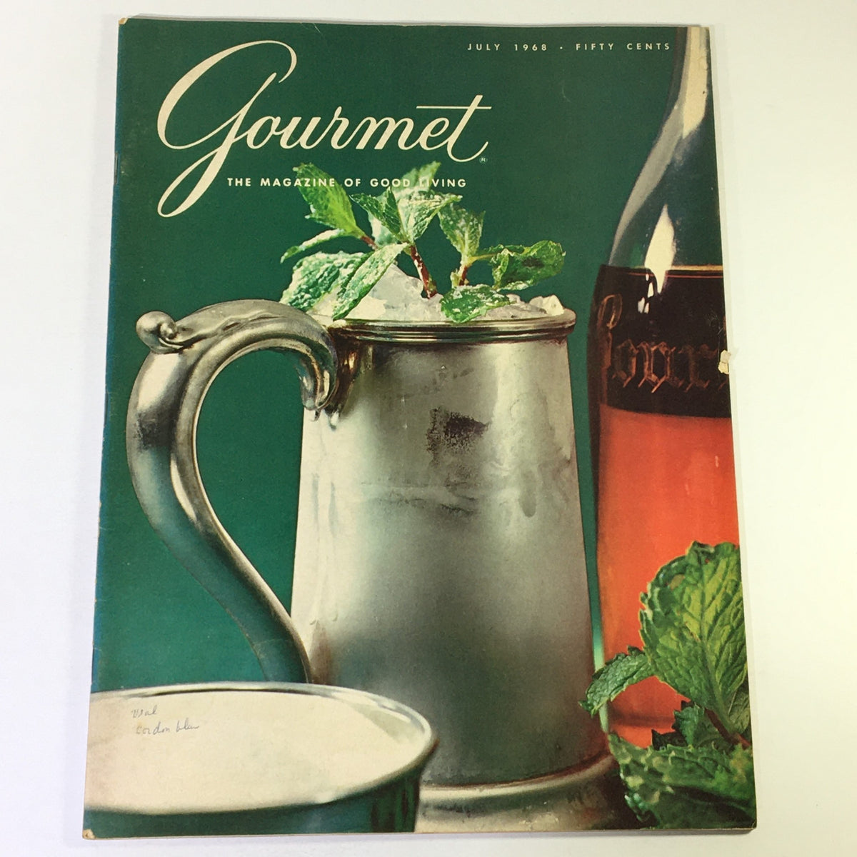 Cover of VTG Gourmet The Magazine of Good Living July 1968, featuring a silver cup with mint leaves, ice, and a bottle of wine in the background, showcasing vintage culinary culture.