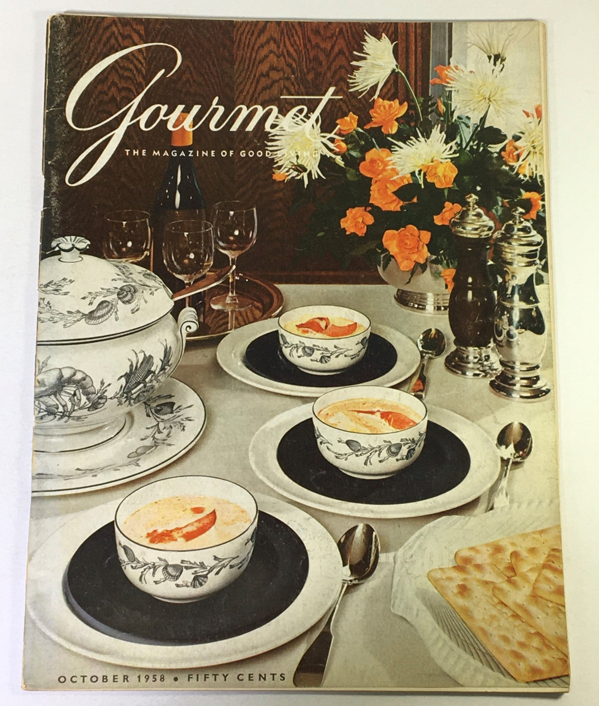 Cover of VTG Gourmet Magazine October 1958 featuring elegant table setting with gourmet dishes and floral arrangements, highlight of the issue 'The Elusive Grouse'.