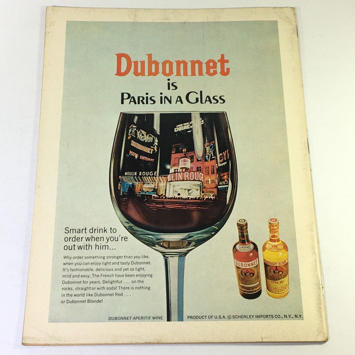 VTG Gourmet The Magazine of Good Living January 1968 advertisement for Dubonnet wine featuring an artistic glass holding the vibrant Paris scene.