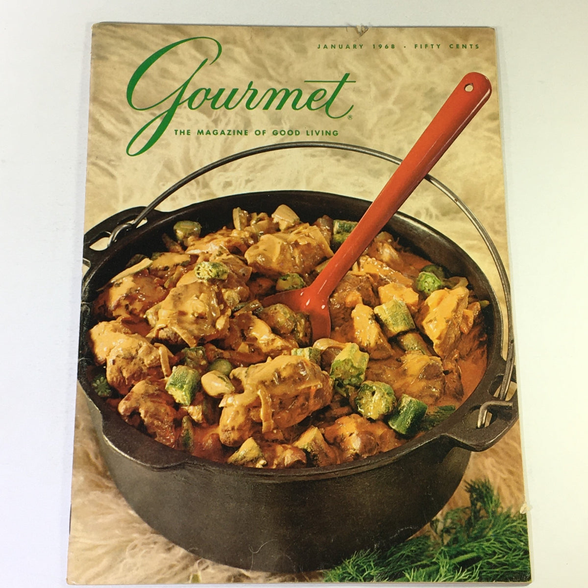 Cover of VTG Gourmet The Magazine of Good Living January 1968 featuring a dish with meat and vegetables in a black pot, emphasizing gourmet cooking.